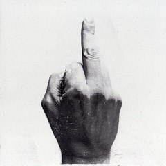 middle finger pointed white grey hand
