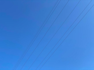 Japanese blue sky and electric wires.