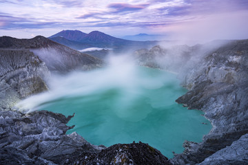 View from above, stunning view of the Ijen volcano with the turquoise-coloured acidic crater lake....