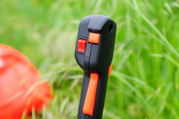 Naklejka premium Knob with trimmer controls. Gas trimmer, equipment controls.