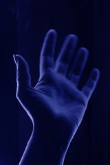 hand on black background