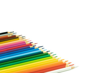 Beautiful blunt colour pencils are arranged together ready to use, it's on the white background.