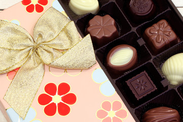Obraz na płótnie Canvas Chocolate candies in a box. Assortment of candies.