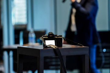 Amature and none professional video recorder static to record speaker in small seminar at...