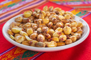 Toasted Andean corn served on a white bowl
