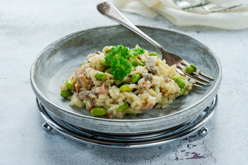 Bacon and mushroom risotto with edamame beans
