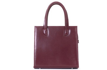 expensive red female leather bag on a handle isolated on a white background
