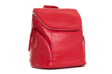 red female backpack on a white background