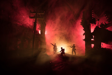 War Concept. Military silhouettes fighting scene on war fog sky background, World War Soldiers...