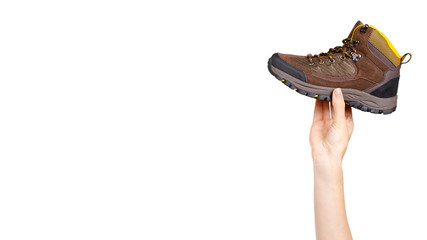 Brown leather kids boots. Isolated on white.