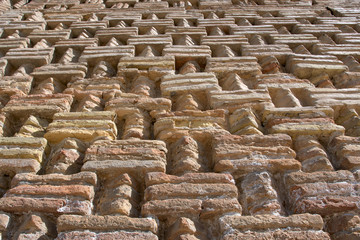 Medieval brick wall of Samanid Mausoleum. Bukhara, Uzbekistan, Central Asia.