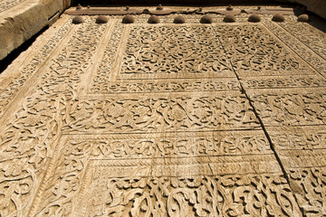 Old woden gate of Tash Khauli palace (or Tosh Hovli, 19th century). Khiva, Uzbekistan.