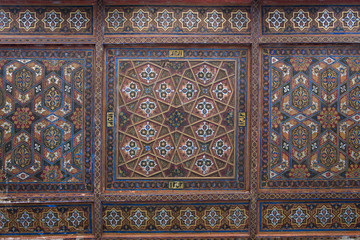 Old wooden ceiling in Kuhna Ark palace (fortress). Khiva, Uzbekistan.