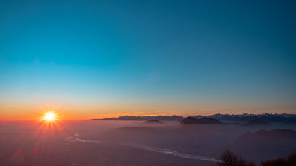Winter sunset from an alpine peak of Friuli-Venezia Giulia