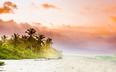 View over sunset over tropical beach by Palomino in Colombia