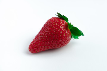 Strawberry with strawberry leaf on white background