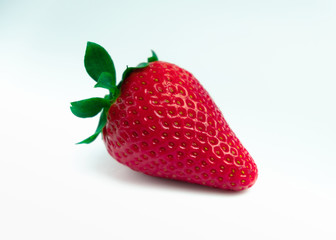 Strawberry with strawberry leaf on white background