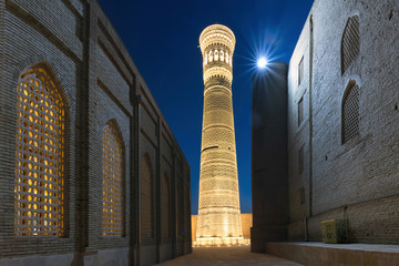 Night view at Great Minaret of the Kalon (symbol of the city). Bukhara, Uzbekistan, Central Asia.