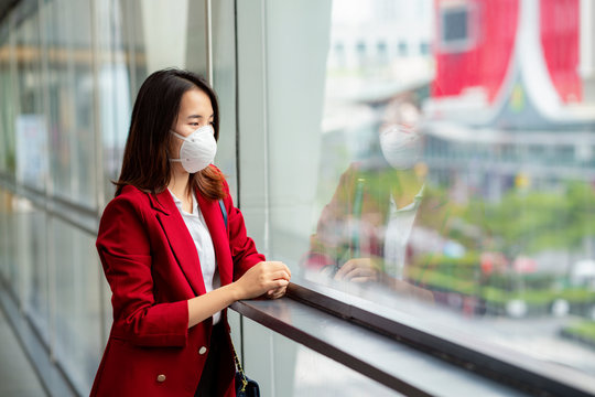 Asian girl use a protection mask for prevent PM 2.5 and corona viruus or covic 19