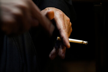 Male hand with a cigarette