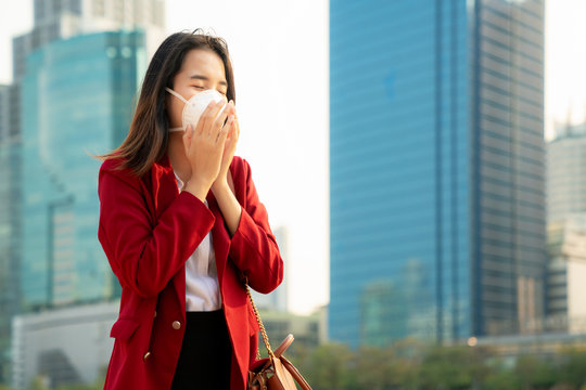 Asian girl use a protection mask for prevent PM 2.5 and corona viruus or covic 19
