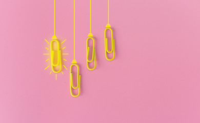 Great ideas concept with paperclip,thinking,creativity,light bulb on blue background,new ideas concept.