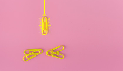 Great ideas concept with paperclip,thinking,creativity,light bulb on blue background,new ideas concept.
