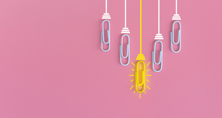 Great ideas concept with paperclip,thinking,creativity,light bulb on blue background,new ideas concept.
