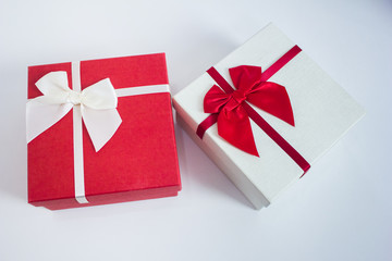 two gift box with ribbon bow on white background