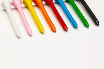 Golf set - golf ball and wooden tees.