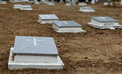 Neglected unmarked graves in Llerena municipal cemetery Spain