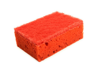 Red kitchen sponge for dishes, household cleaning is isolated on white background.