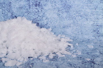 Crushed ice on a blue background