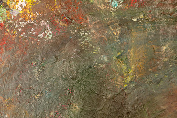 Background image of bright oil-paint palette closeup.