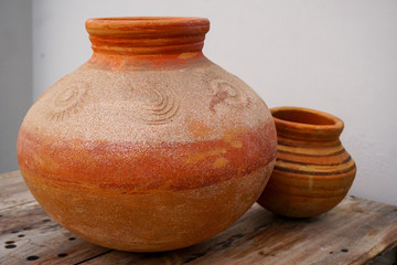 A close up shot of an earthen pot or a clay pot. - obrazy, fototapety, plakaty