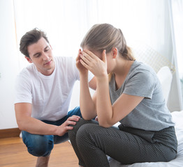 sad man sit in bed and thinking with man comfort