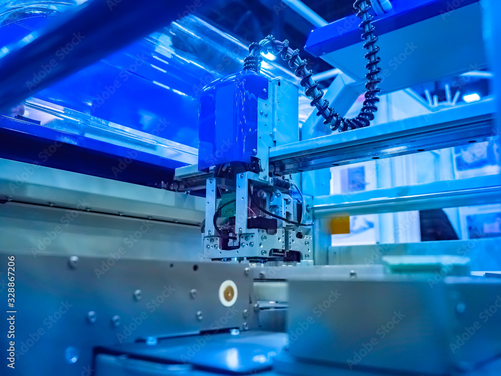Poster automated production. machine with software control. manufacture of products without human intervent