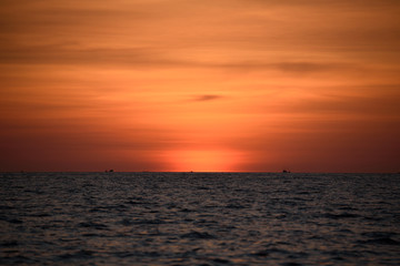 Beautiful orange sky and sea after sunset
