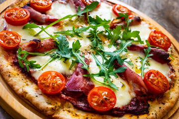 Margherita pizza on wooden table