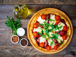 Margherita pizza on wooden table