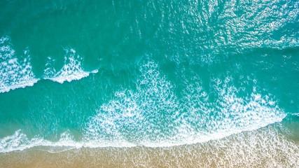 Top view aerial image from drone of an stunning beautiful sea landscape beach with turquoise water with copy space for your text.Beautiful Sand beach with turquoise water,aerial UAV drone shot