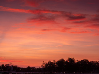 siluate after sunset under red sky