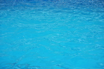 Blue Water Background. Water surface texture. Blue water ripple surface