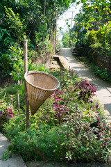 Traditional bamboo basket dustbin at Shillong, India