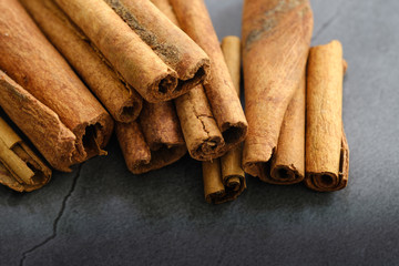 dry Cinnamon stick isolated on black ground