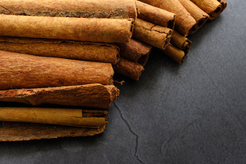 dry Cinnamon stick isolated on black ground