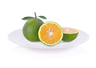 Orange  fruit on plate isolated on white background.