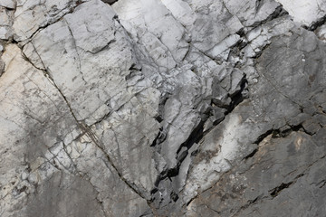Grey stone wall from an historic castle as texture and background