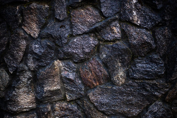 Masonry texture. Background of stones. Part of the wall. The design of the fence. Rough rough stone. Blank for the design of the fence.