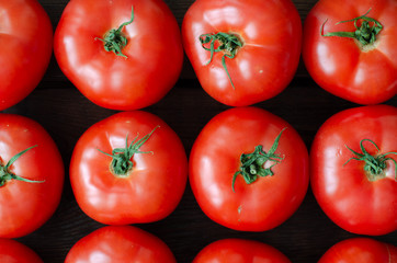 organic tomatoes background. Top view. Background of tomatoes.